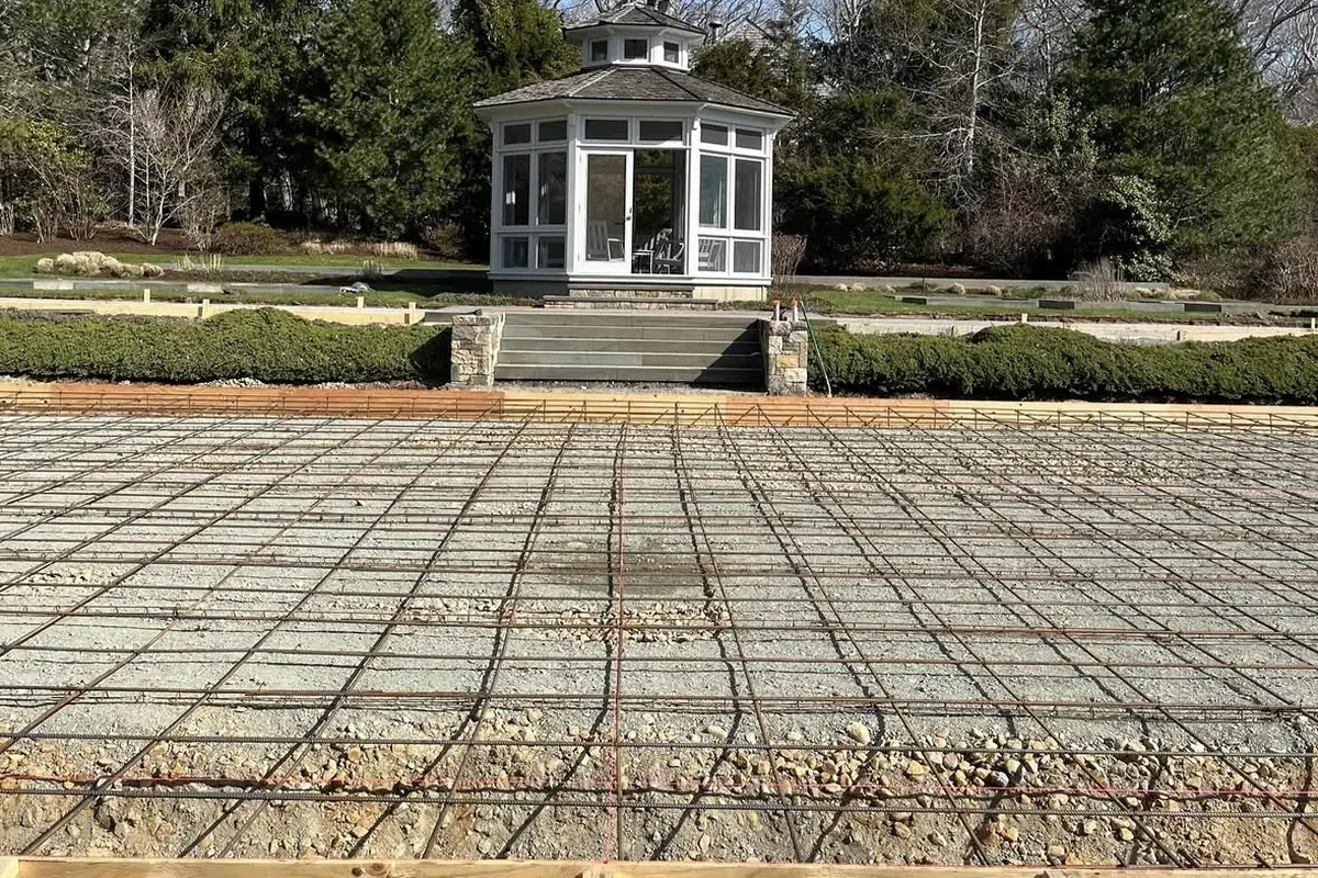 Formed padel court slab with steel reinforcement in place before the concrete pour at a private residence